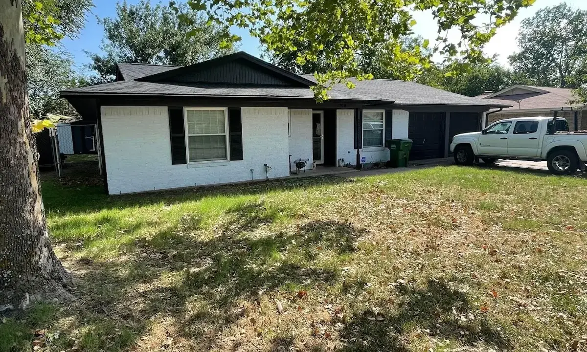 Professional roofing crew working on a residential roof in Pinellas Park